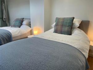 Ένα ή περισσότερα κρεβάτια σε δωμάτιο στο K Suites - Malt House