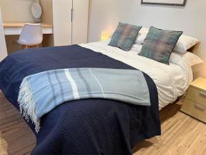 Ένα ή περισσότερα κρεβάτια σε δωμάτιο στο K Suites - Malt House