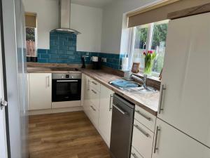 Η κουζίνα ή μικρή κουζίνα στο K Suites - Malt House +20 φωτογραφίες