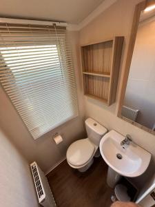 Et badeværelse på Holiday home by the river Nidd 5