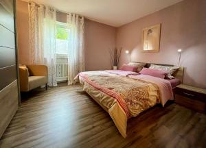 Giường trong phòng chung tại Ferienwohnung Barokas