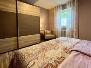 Giường trong phòng chung tại Ferienwohnung Barokas