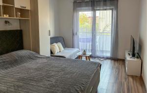 En eller flere senge i et værelse på Lovely Apartment In Vir With Wifi