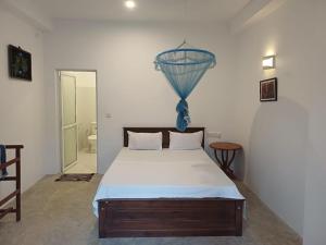 Ένα ή περισσότερα κρεβάτια σε δωμάτιο στο villa Calm Haven