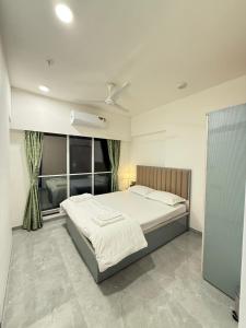 Postel nebo postele na pokoji v ubytování CozyKey Kalina