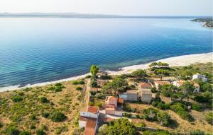 an aerial view of a house next to the beach at Stunning Home In Carloforte With Wifi in Carloforte +25 photos