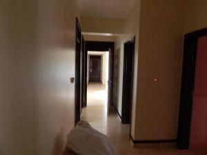 Ένα ή περισσότερα κρεβάτια σε δωμάτιο στο Kacyiru Executive Apartments