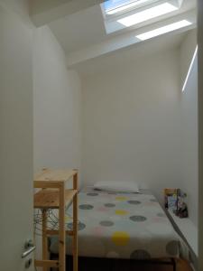 Ένα ή περισσότερα κρεβάτια σε δωμάτιο στο l'appartamentino in centro storico +8 φωτογραφίες