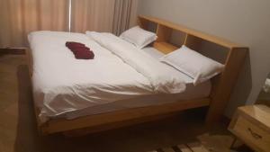 Ένα ή περισσότερα κρεβάτια σε δωμάτιο στο Rebecca Cottages +3 φωτογραφίες