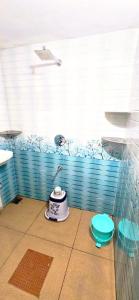 Ένα μπάνιο στο Dishaa Home Stay