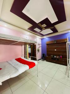 Ένα ή περισσότερα κρεβάτια σε δωμάτιο στο ADH Amilia Nest