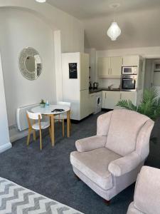 Η κουζίνα ή μικρή κουζίνα στο The Downtown Loft