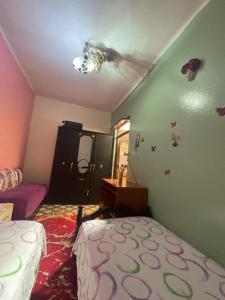 Postel nebo postele na pokoji v ubytování Maison Seddiqi