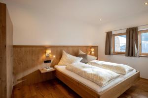 Ένα ή περισσότερα κρεβάτια σε δωμάτιο στο Haus Boarbauer