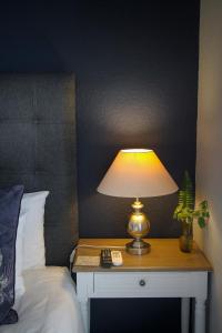 Ένα ή περισσότερα κρεβάτια σε δωμάτιο στο Olive tree private rooms in Stellenbosch- No Load Shedding +14 φωτογραφίες