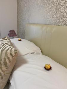 Ένα ή περισσότερα κρεβάτια σε δωμάτιο στο The Downtown Loft