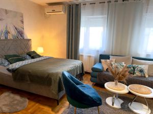 Ένα ή περισσότερα κρεβάτια σε δωμάτιο στο Belgrade Apartment 1