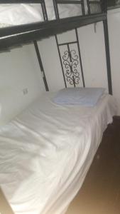 Postel nebo postele na pokoji v ubytování Kings Palace - Downtown Cairo