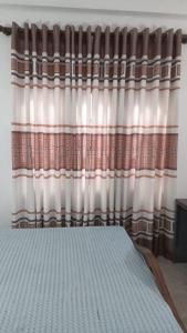 Ένα ή περισσότερα κρεβάτια σε δωμάτιο στο New Moon