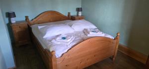 Postel nebo postele na pokoji v ubytování Hygge Młyńsko