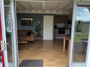 Fotografie z fotogalerie ubytování Heggenmus I Huisje met Haard in de Tuin v destinaci Zwiggelte