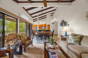 a living room with a couch and a table at Wailea Ekolu 1604 · WE 1604 Wailea 2BD Condo w AC Pool Near Beac in Kihei