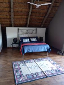 Voodi või voodid majutusasutuse Athule Inn - Mozambique toas