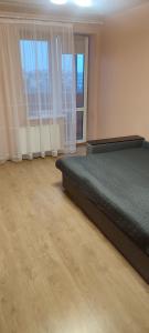 Ένα ή περισσότερα κρεβάτια σε δωμάτιο στο Апартаменти ЖК Тріумф,ЖД ВОКЗАЛ, ОБЛАСНА ЛІКАРНЯ,