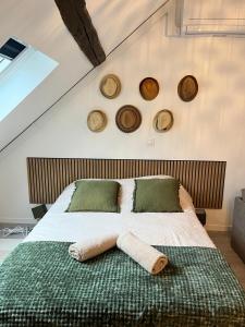 Una cama o camas en una habitación de Studio moderne Plein Centre Nemours