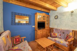 Μια τηλεόραση ή/και κέντρο ψυχαγωγίας στο Casa Rural Abuelo Luis