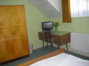 TV a/nebo společenská místnost v ubytování Hotel Feilen-Wolff
