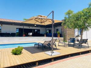 Πισίνα στο ή κοντά στο Pebetse Guesthouse