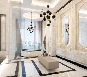 a lobby with a tub in the middle of a building at Mandarin Oriental Downtown, Dubai in Dubai +46 photos