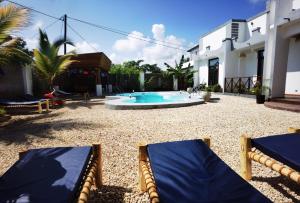 Πισίνα στο ή κοντά στο Villa Flower Zanzibar