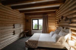 Postel nebo postele na pokoji v ubytování LAVANDA hotel club