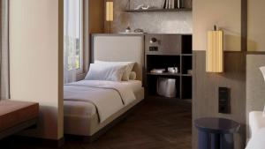 Ένα ή περισσότερα κρεβάτια σε δωμάτιο στο Hotel Schani City