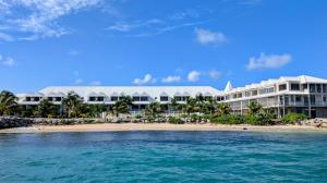 a view of a resort from the water at Infinity View Beach House, 2 bdr in Baie Nettle