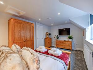 Ένα ή περισσότερα κρεβάτια σε δωμάτιο στο Nest Holiday Home