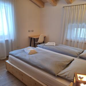 Postel nebo postele na pokoji v ubytování Cesa de Conesel