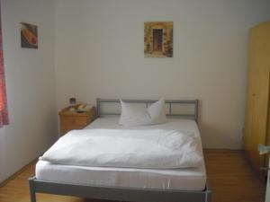 Postel nebo postele na pokoji v ubytování Hotel Feilen-Wolff