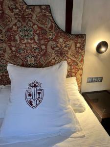 Postel nebo postele na pokoji v ubytování Convento Parador San Esteban de Gormaz