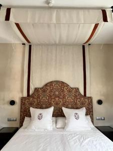 Postel nebo postele na pokoji v ubytování Convento Parador San Esteban de Gormaz