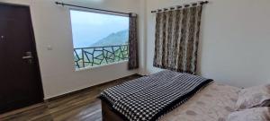 Giường trong phòng chung tại Cloud Castle, Panchalimedu