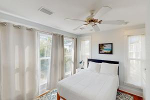 Ένα ή περισσότερα κρεβάτια σε δωμάτιο στο Shore Bird +23 φωτογραφίες