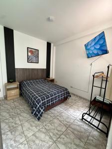 Ένα ή περισσότερα κρεβάτια σε δωμάτιο στο Morada Apart