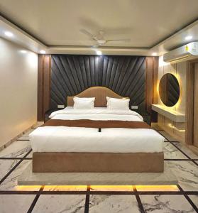 Ένα ή περισσότερα κρεβάτια σε δωμάτιο στο Hotel Royal Gold Palace