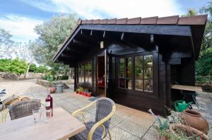 Κήπος έξω από το Private Wooden House