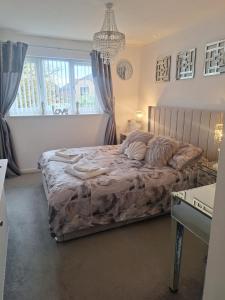 Postel nebo postele na pokoji v ubytování Gorgeous Sandpiper Mews