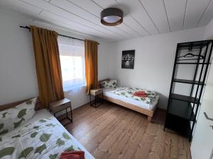 En eller flere senge i et værelse på Siedlung