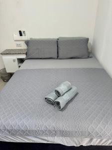 Postel nebo postele na pokoji v ubytování Residencial Praiana